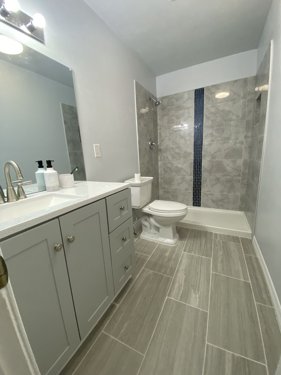 Bath and tub surround by Berrian Construction